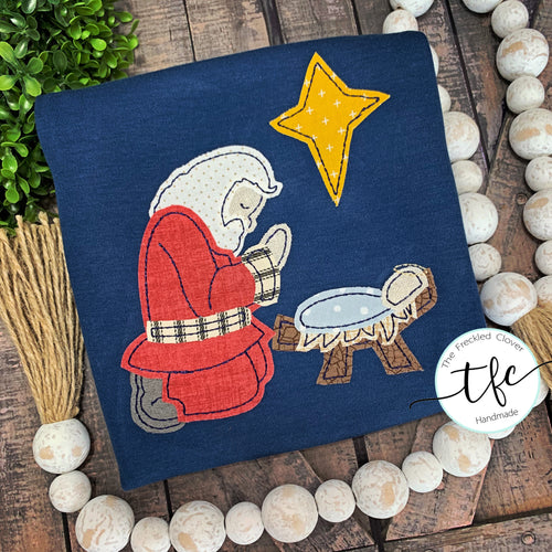 {Kneeling Santa} youth tee